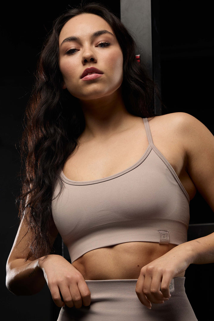 Seamless sportmelltartó